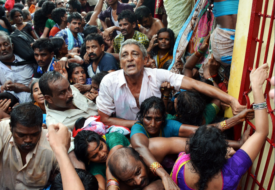 Six killed, dozens injured in India temple stampede