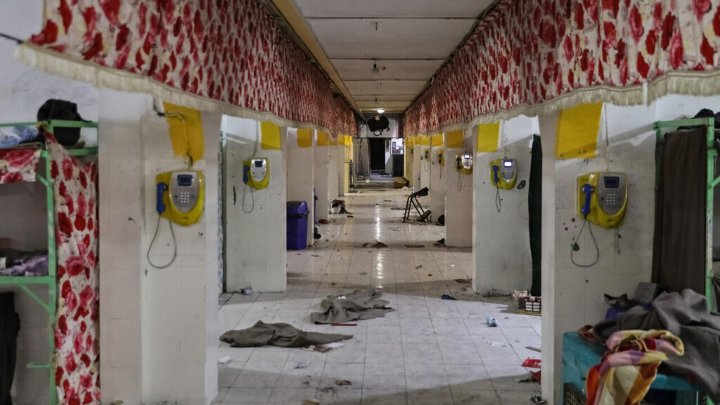 Employees and visiting families among dead at Evin Prison